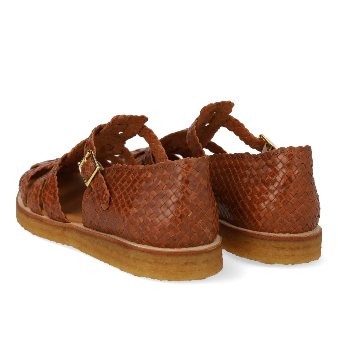 Hand-braided strap sandal with buckle